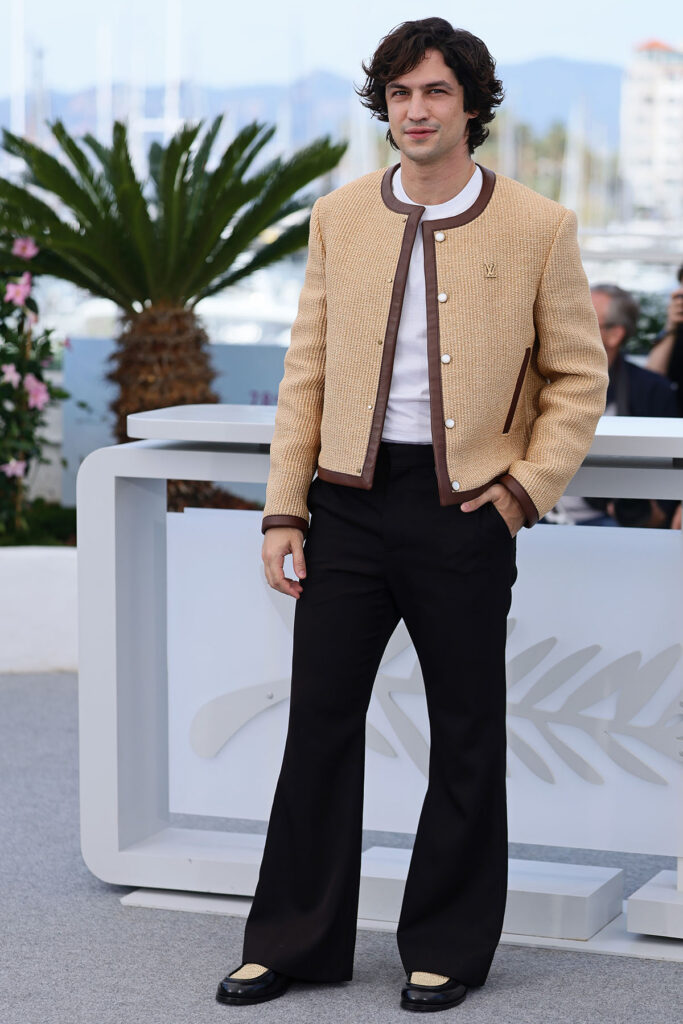 Gabriel Leone poses during the 'O Agente Secreto" (The Secret Agent) photocall at the 78th annual Cannes Film Festival 2025 Louis Vuitton