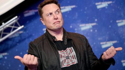 SpaceX owner and Tesla CEO Elon Musk arrives on the red carpet for the Axel Springer Award 2020 on December 01, 2020 in Berlin, Germany.