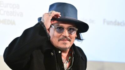 Actor Johnny Depp attends the press conference of 'Modi, Three days on the Wing of Madness' at Real Alcazar on November 09, 2024 in Seville, Spain.
