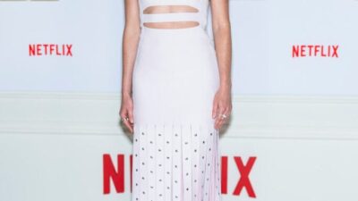 Meghann Fahy arrives at the Netflix Premiere of "Sirens" Proenza Schouler fringe car wash skirt