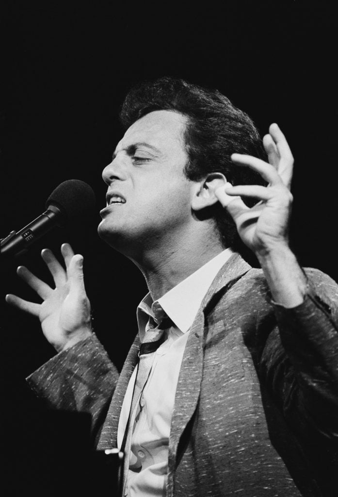 American singer-songwriter, composer and pianist Billy Joel performing live, UK, 7th June 1984.