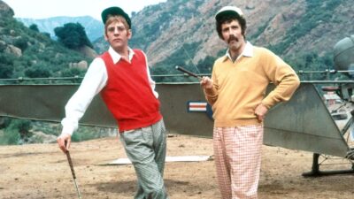 Hawkeye and Trapper John in a golf course looking to the distance in M*A*S*H