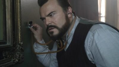 Jack Black as Jonathan trying to hear the clock in The House with a Clock in its Walls