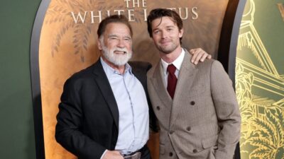 Arnold Schwarzenegger and son Patrick Schwarzenegger at teh White Lotus premiere on February 10, 2025.