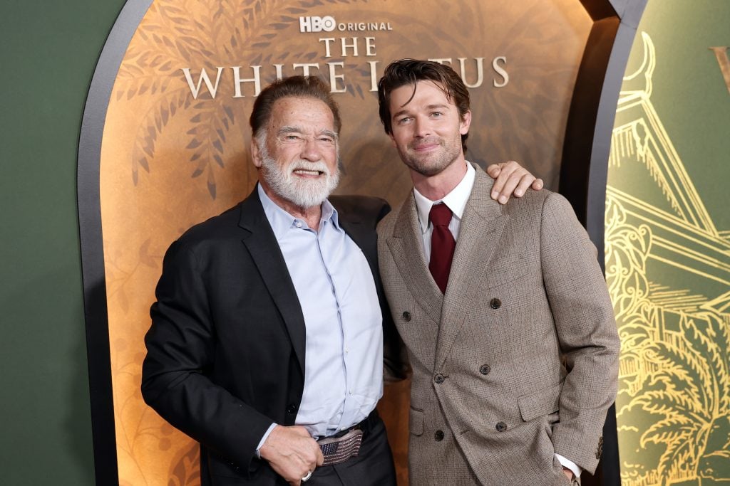 Arnold Schwarzenegger and son Patrick Schwarzenegger at teh White Lotus premiere on February 10, 2025.