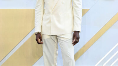 Damson Idris Wore Tommy Hilfiger To The 'F1: The Movie' London Premiere yellow suit