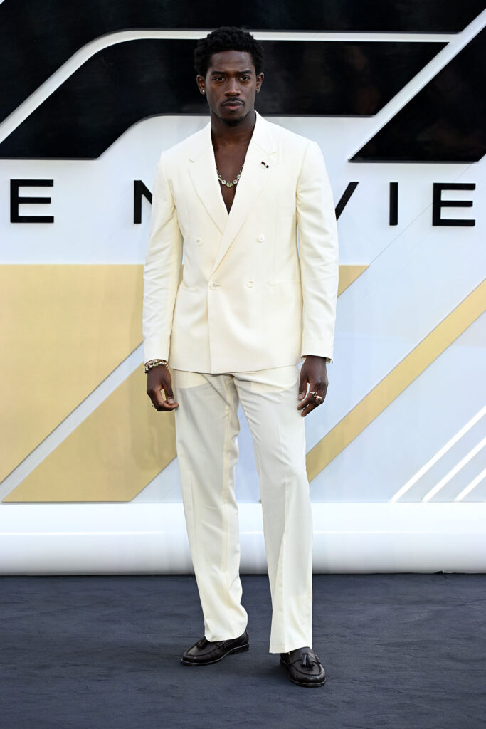 Damson Idris Wore Tommy Hilfiger To The 'F1: The Movie' London Premiere yellow suit