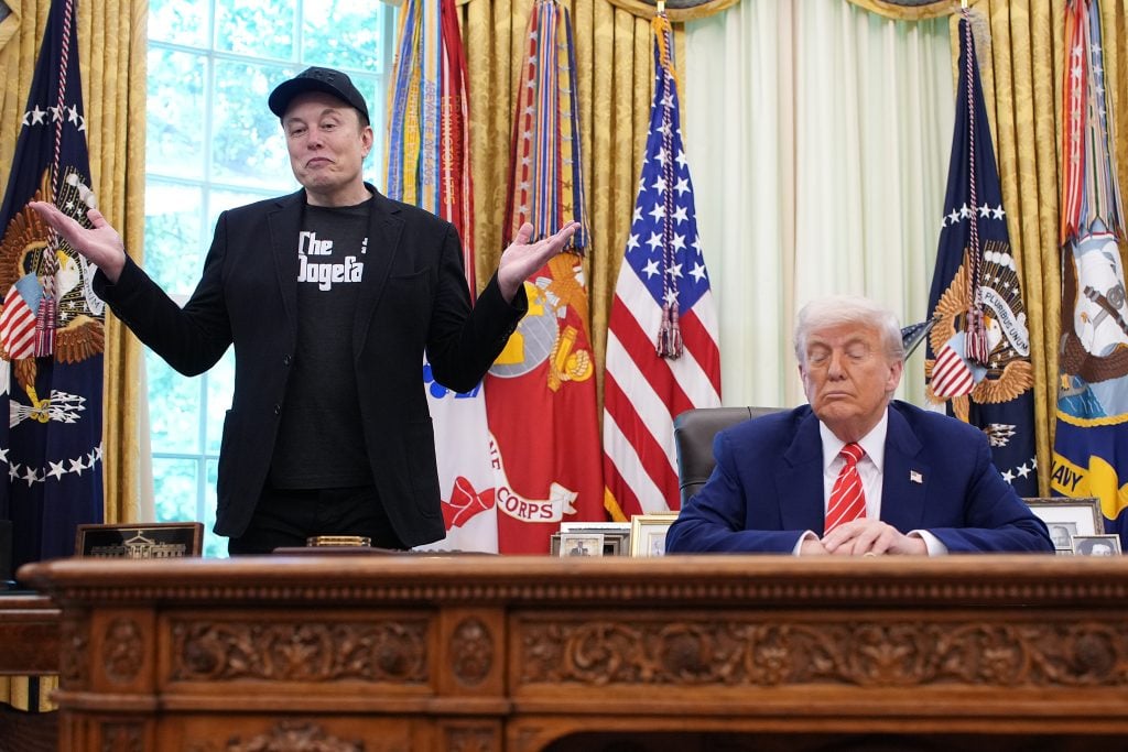 Tesla CEO Elon Musk speaks alongside U.S. President Donald Trump to reporters in the Oval Office of the White House on May 30, 2025 in Washington, DC. Musk, who served as an adviser to Trump and led the Department of Government Efficiency, announced he would leave his role in the Trump administration to refocus on his businesses.