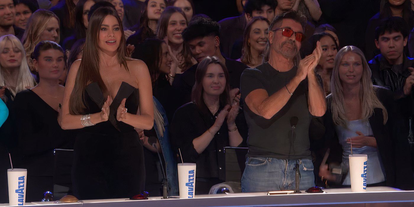 America's Got Talent's Sofia Vergara and Simon Cowell standing and clapping