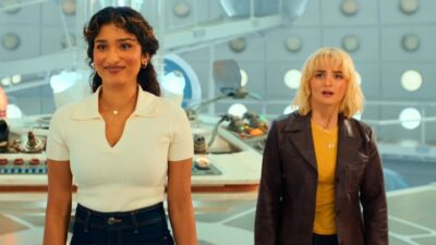 Varada Sethu smiling as Belinda Chandra and Millie Gibson looking concerned as Ruby Sunday in Doctor Who