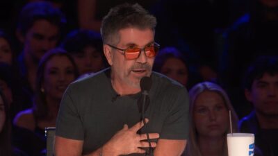 America's Got Talent's judge Simon Cowell sitting in his judges seat