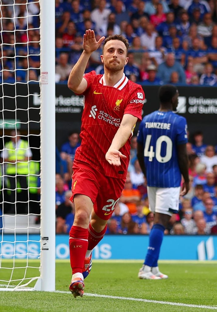 Diogo Jota of Liverpool celebrates scoring his team's first goal during the Premier League match between Ipswich Town FC and Liverpool FC at Portman Road on August 17, 2024 in Ipswich, England.