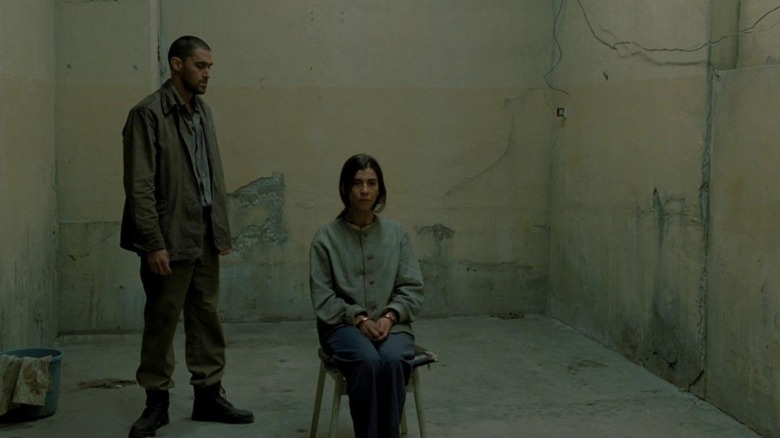 A broken woman and her abuser during the Lebanese Civil War, in Incendies