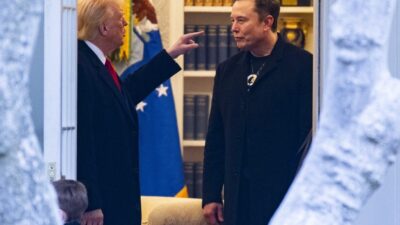 Donald Trump and Elon Musk speak before departing the White House on his way to his South Florida home in Mar-a-Lago in Florida on March 14, 2025.