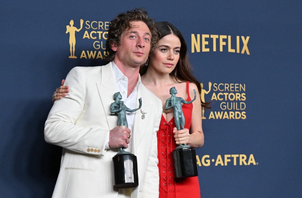 US actor Jeremy Allen White and actress Molly Gordon pose with the awards for Outstanding Performance by a Male Actor in a Comedy Series (Allen White) and Outstanding Performance by an Ensemble in a Comedy Series for