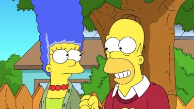 An older Homer smiles at a worried Marge in The Simpsons