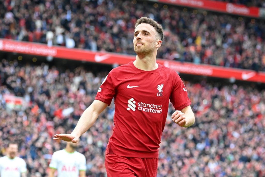 Diogo Jota of Liverpool celebrates after scoring the team's fourth goal during the Premier League match between Liverpool FC and Tottenham Hotspur at Anfield on April 30, 2023 in Liverpool, England.