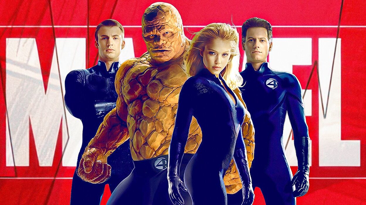 The cast of 2005's Fantastic Four in front of a Marvel Banner